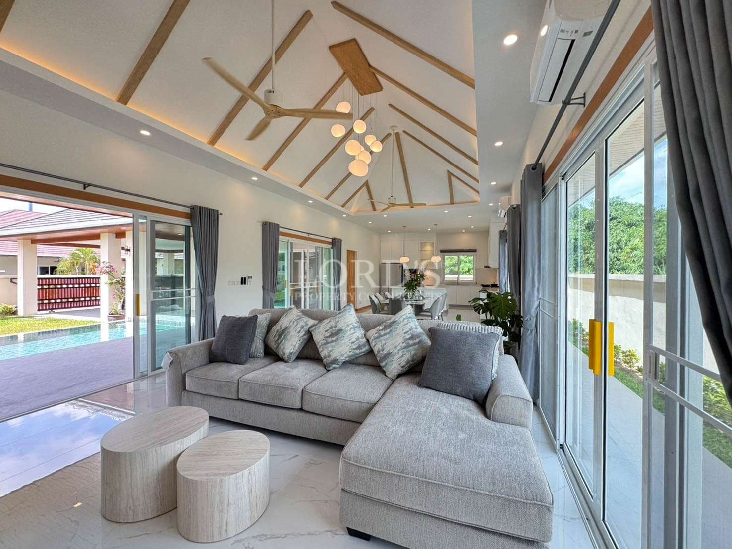 Modern living room with pool view
