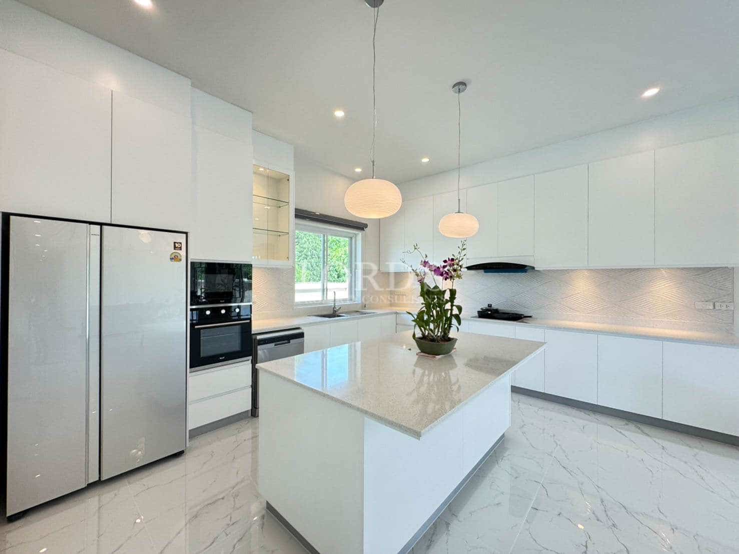 Modern kitchen with white cabinetry