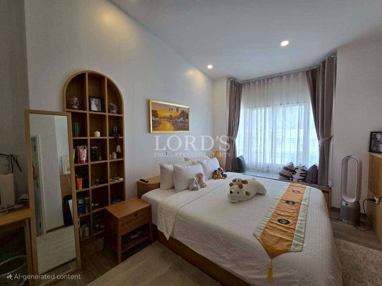 Cozy bedroom with decorative elements.