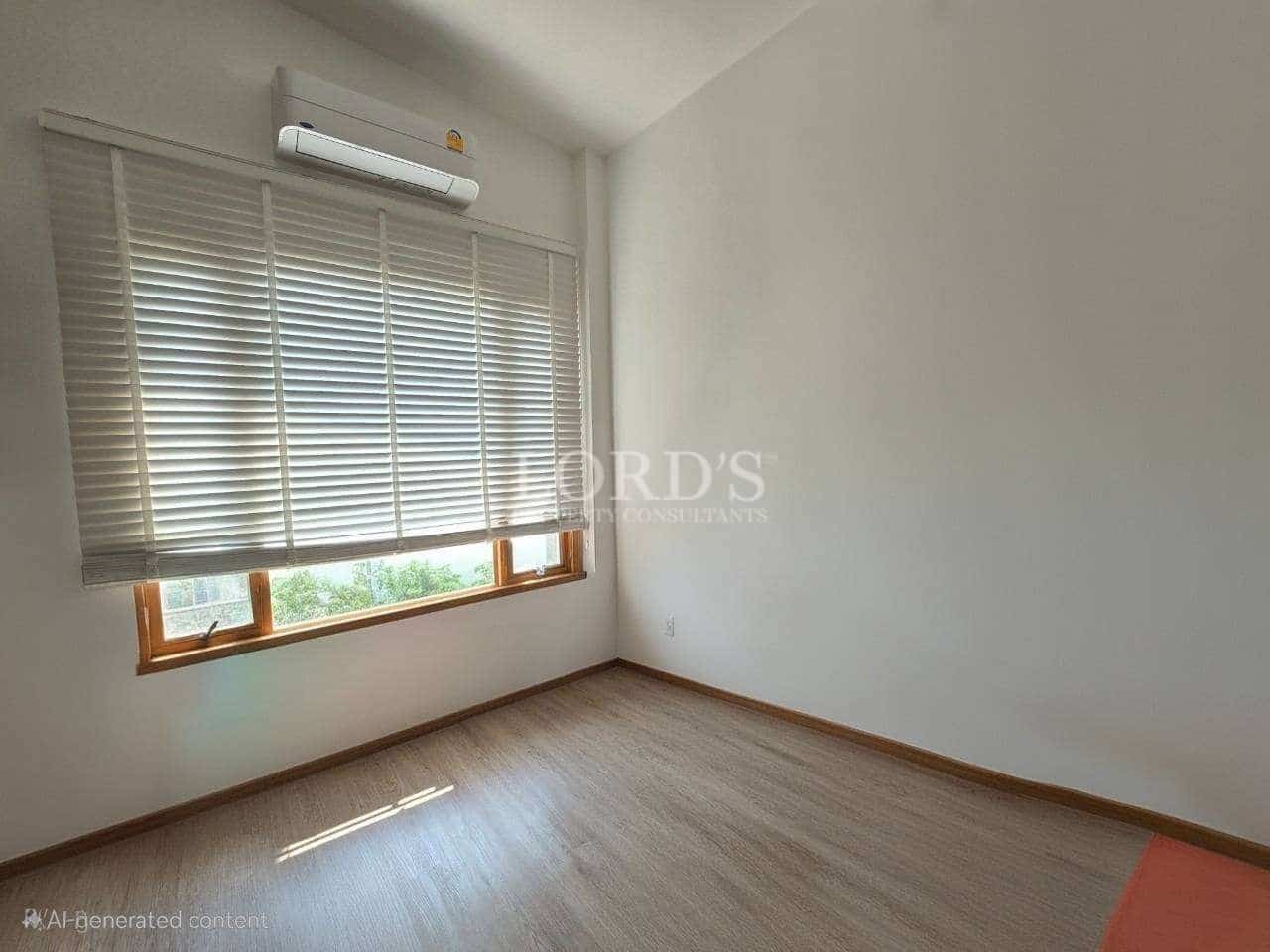 Empty room with window and blinds