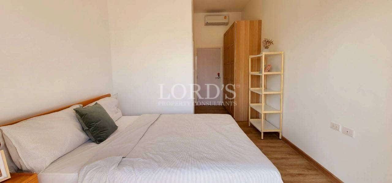 Minimalist bedroom with wooden furniture