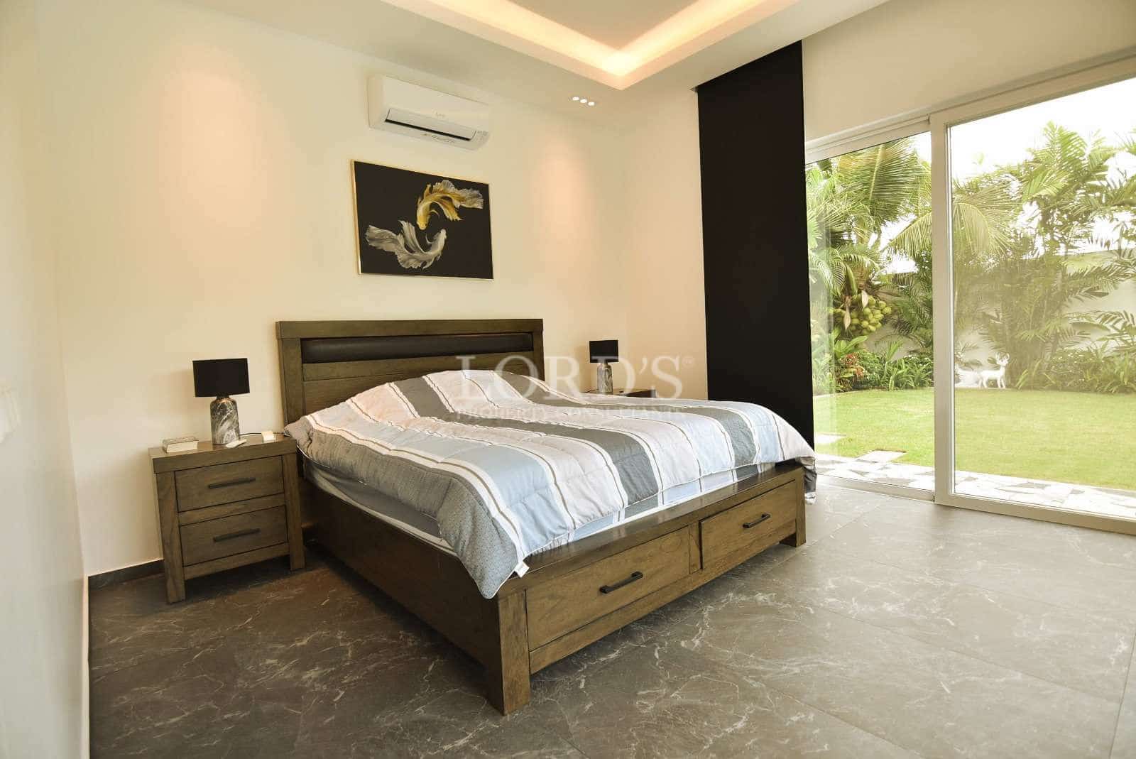 Modern bedroom with large window