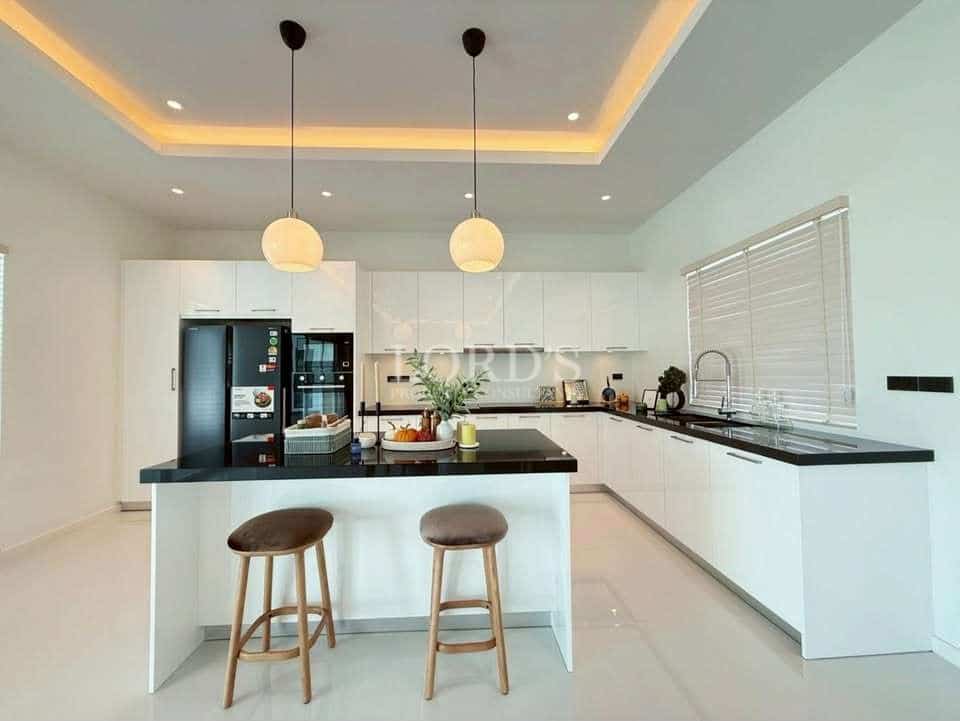 Modern kitchen with island and stools