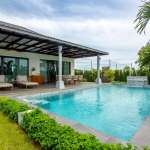 Modern villa with pool and greenery