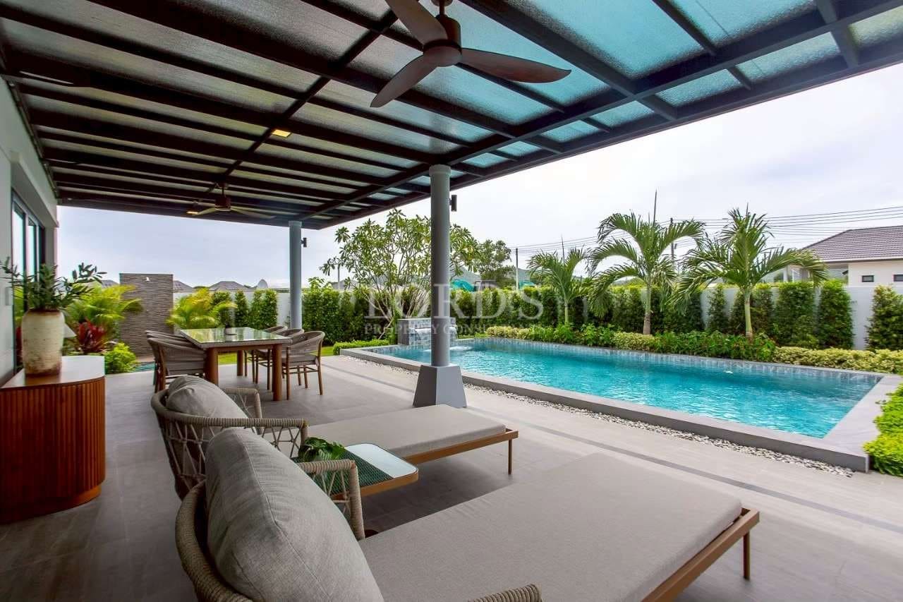 Modern patio with pool view