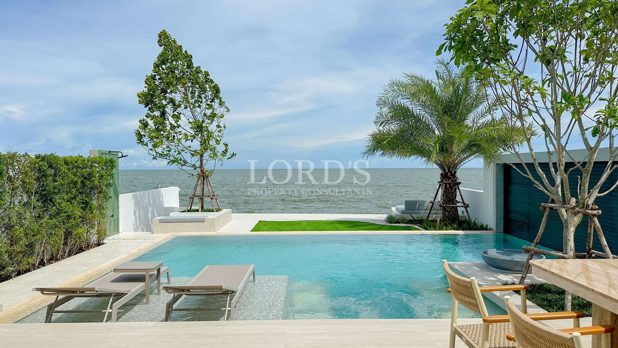 Luxury poolside view by the sea
