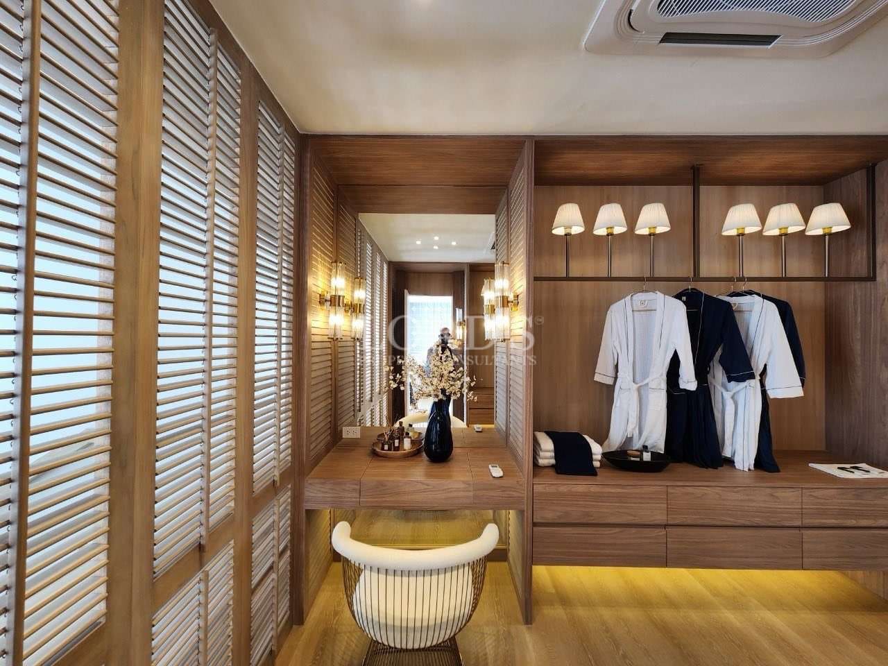 Modern dressing area with wooden accents