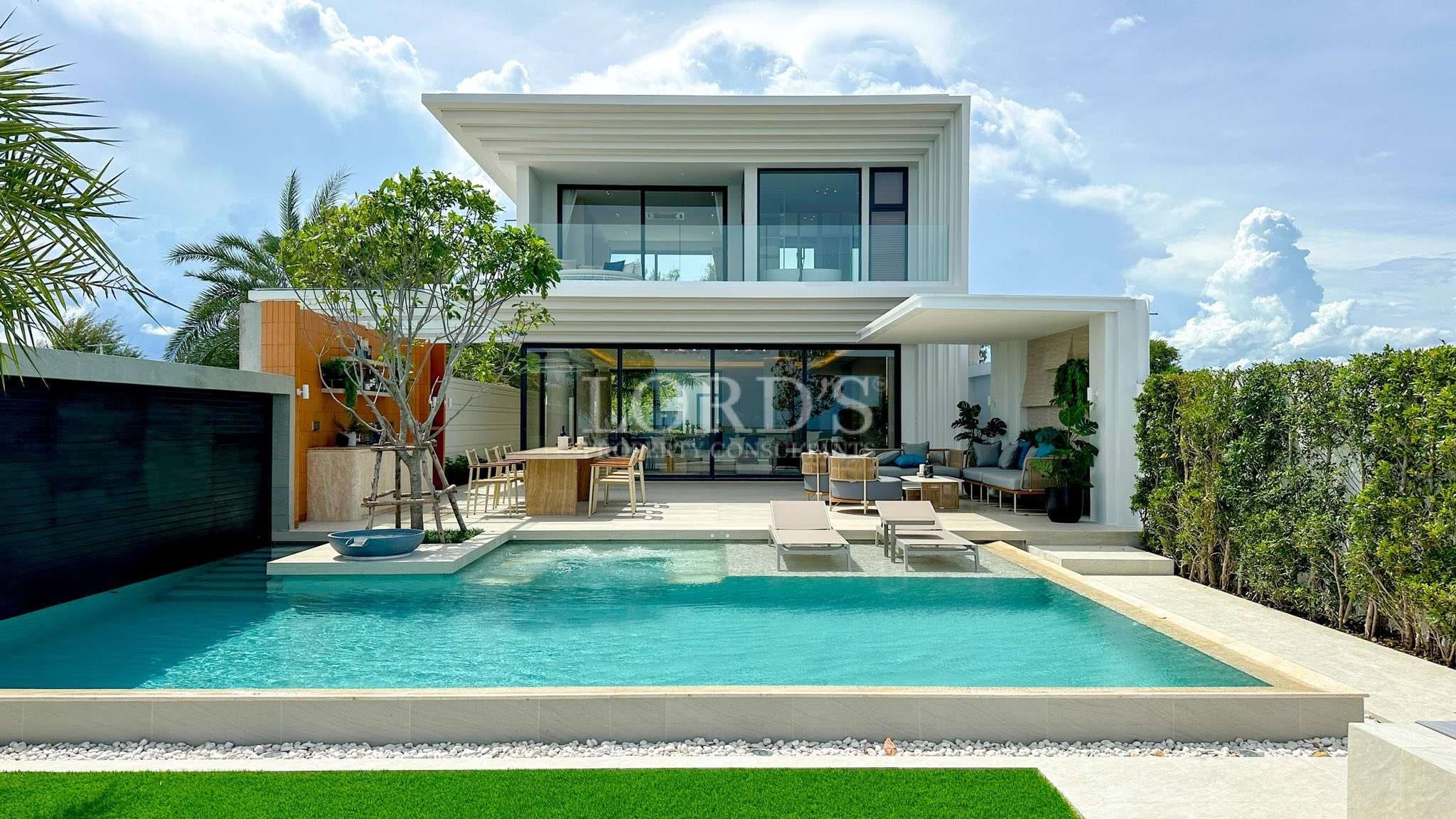 Modern house with pool and greenery