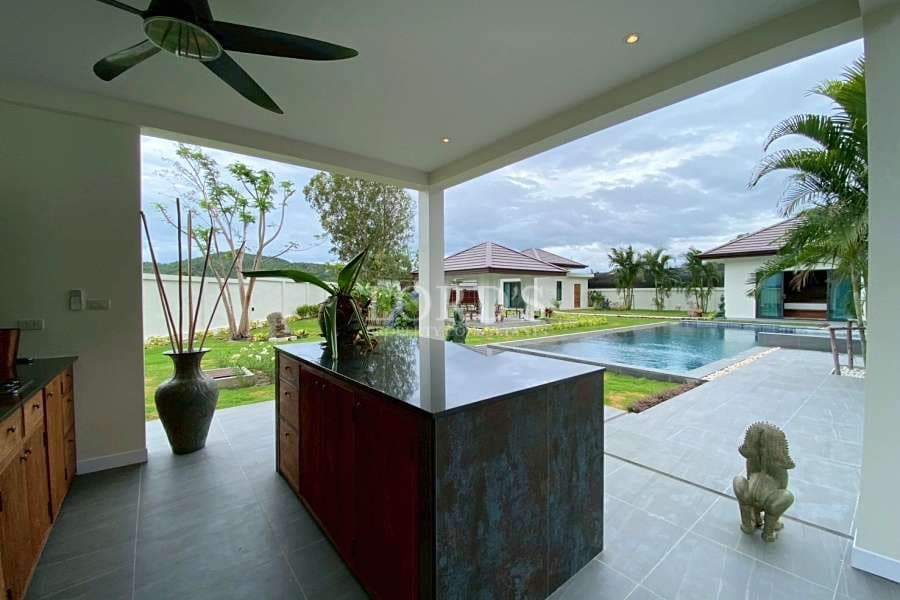 Modern home with pool and garden