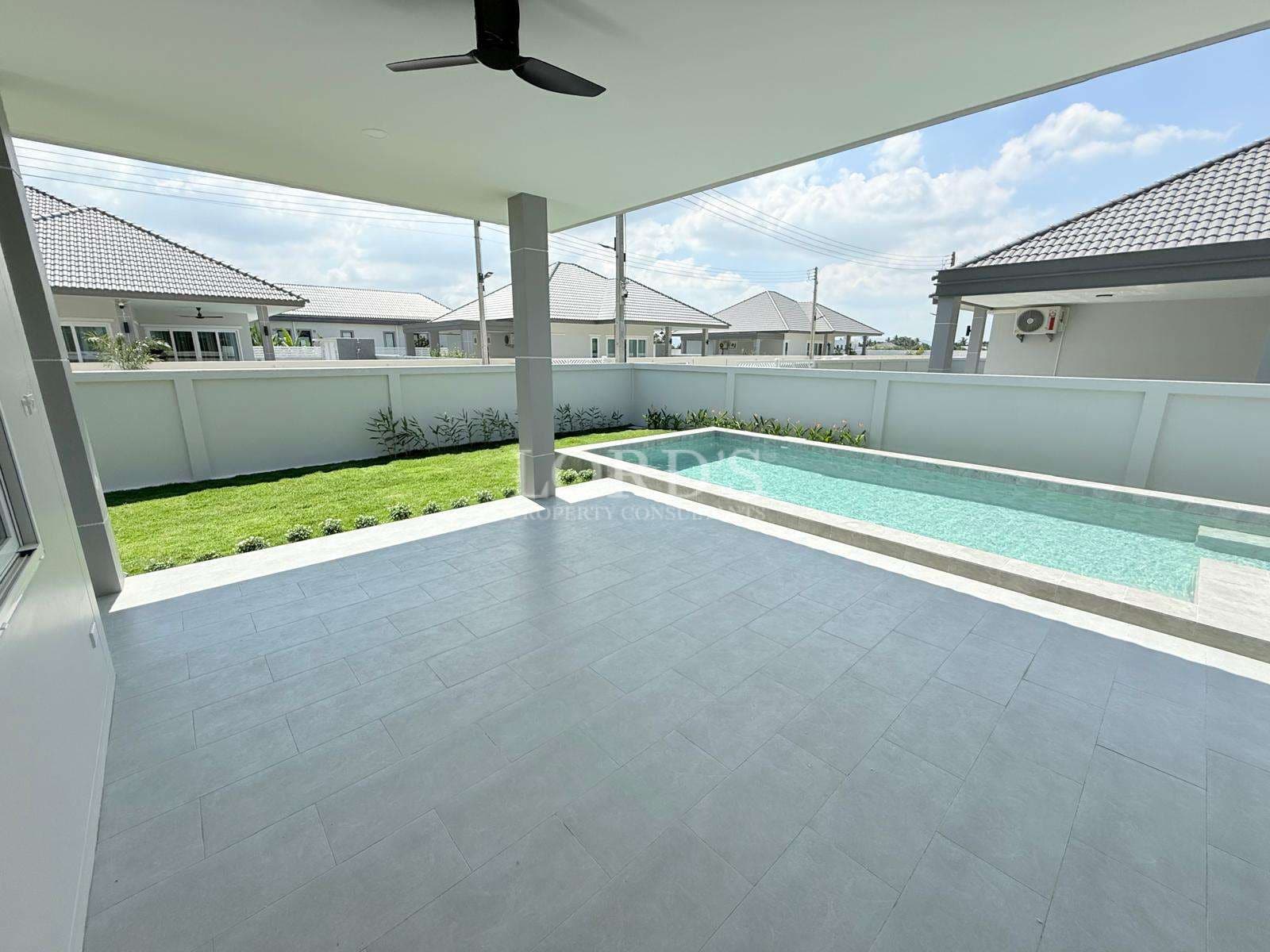 Modern patio with pool view