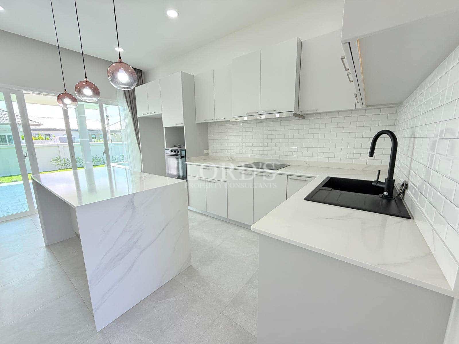 Modern kitchen with marble countertops