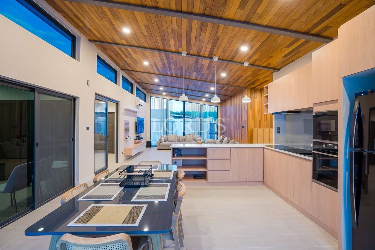 Modern kitchen with wooden accents.