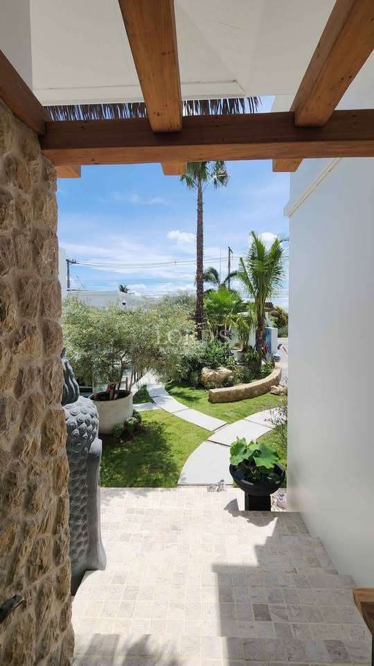 Sunny garden view from entrance