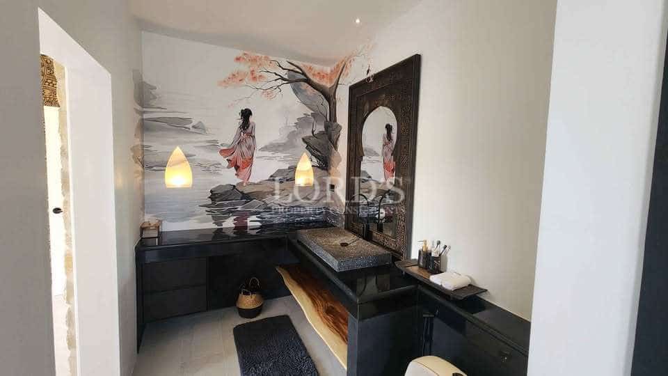 Elegant bathroom with artistic mural