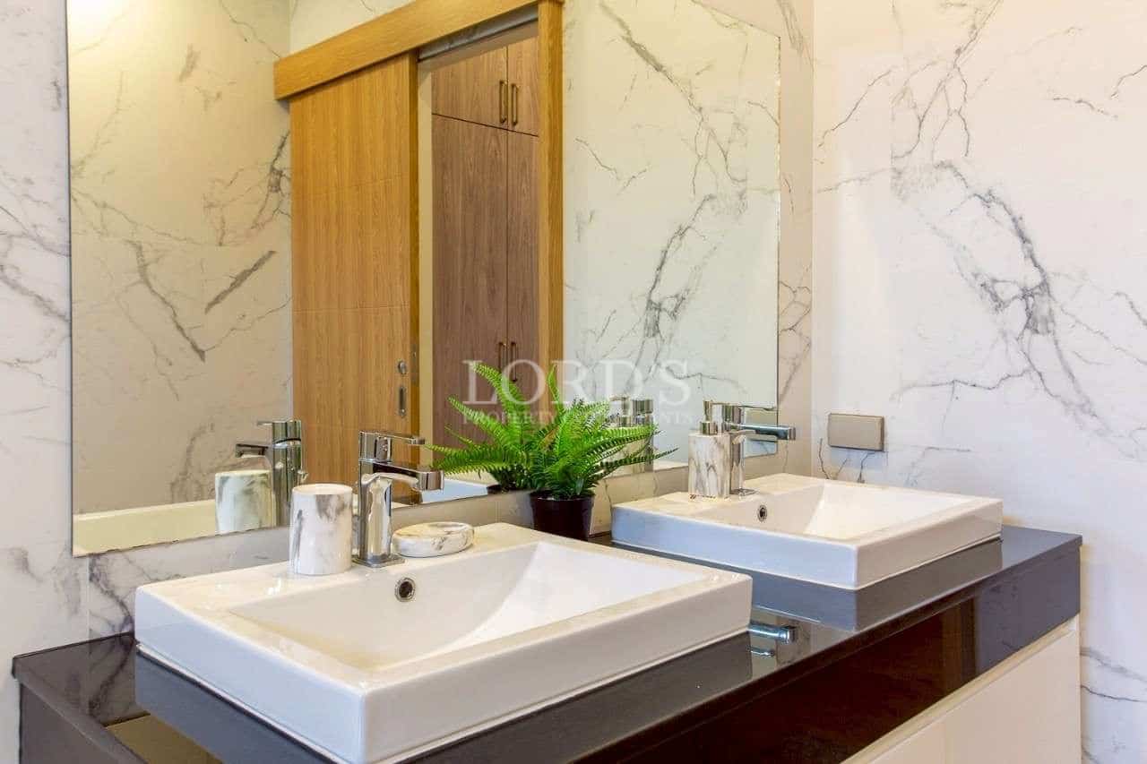 Modern bathroom with marble accents