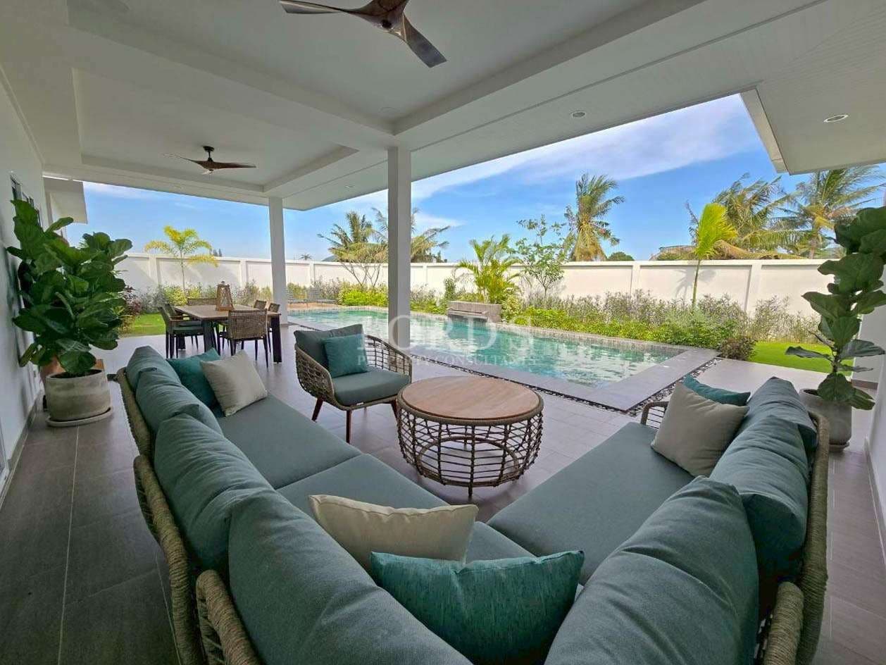 Modern patio with pool view