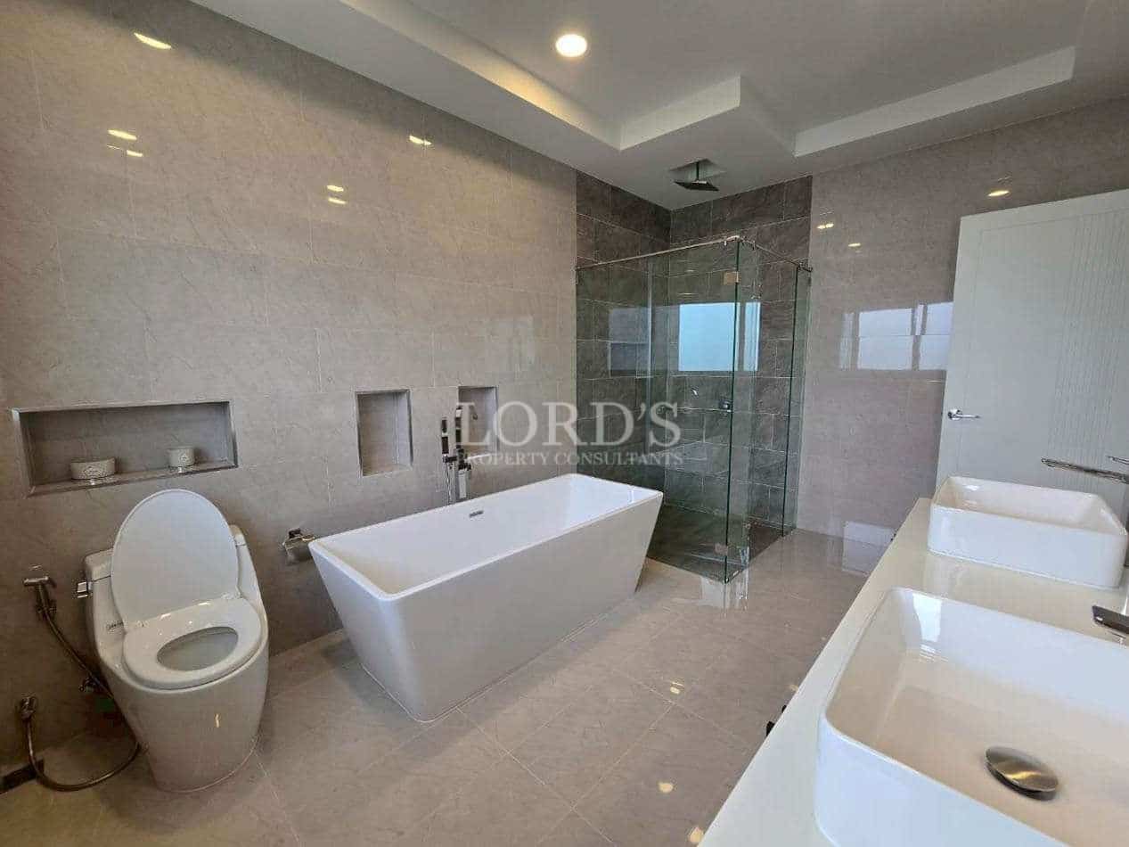 Modern bathroom with bathtub and shower