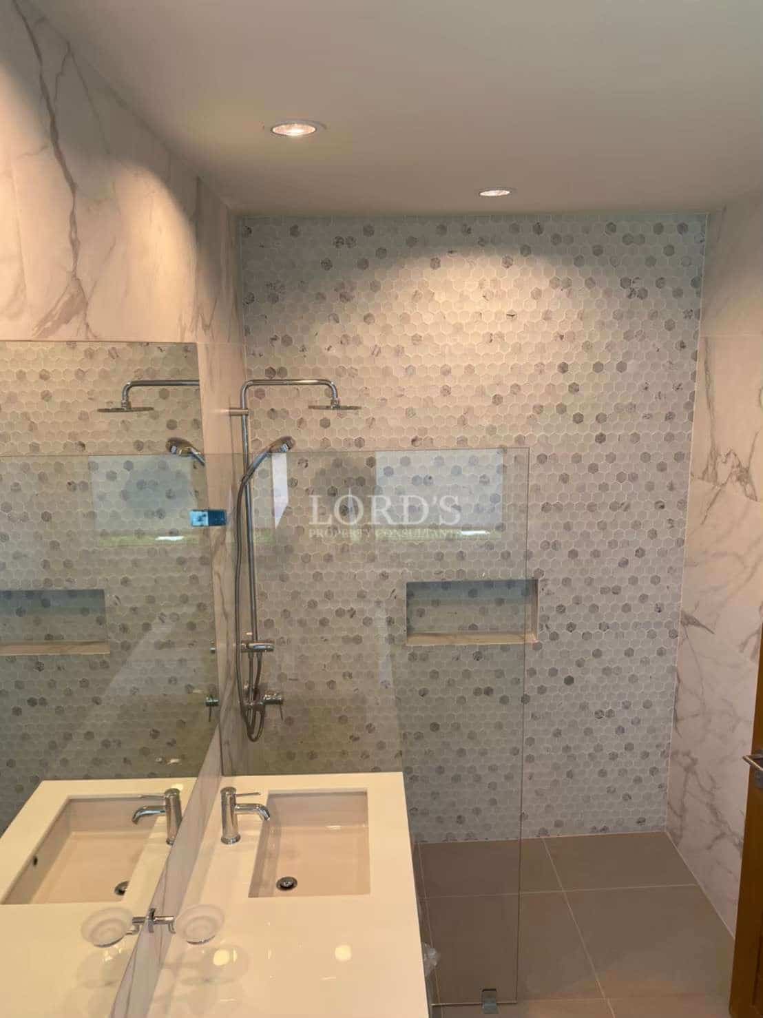 Modern bathroom with marble and tiles