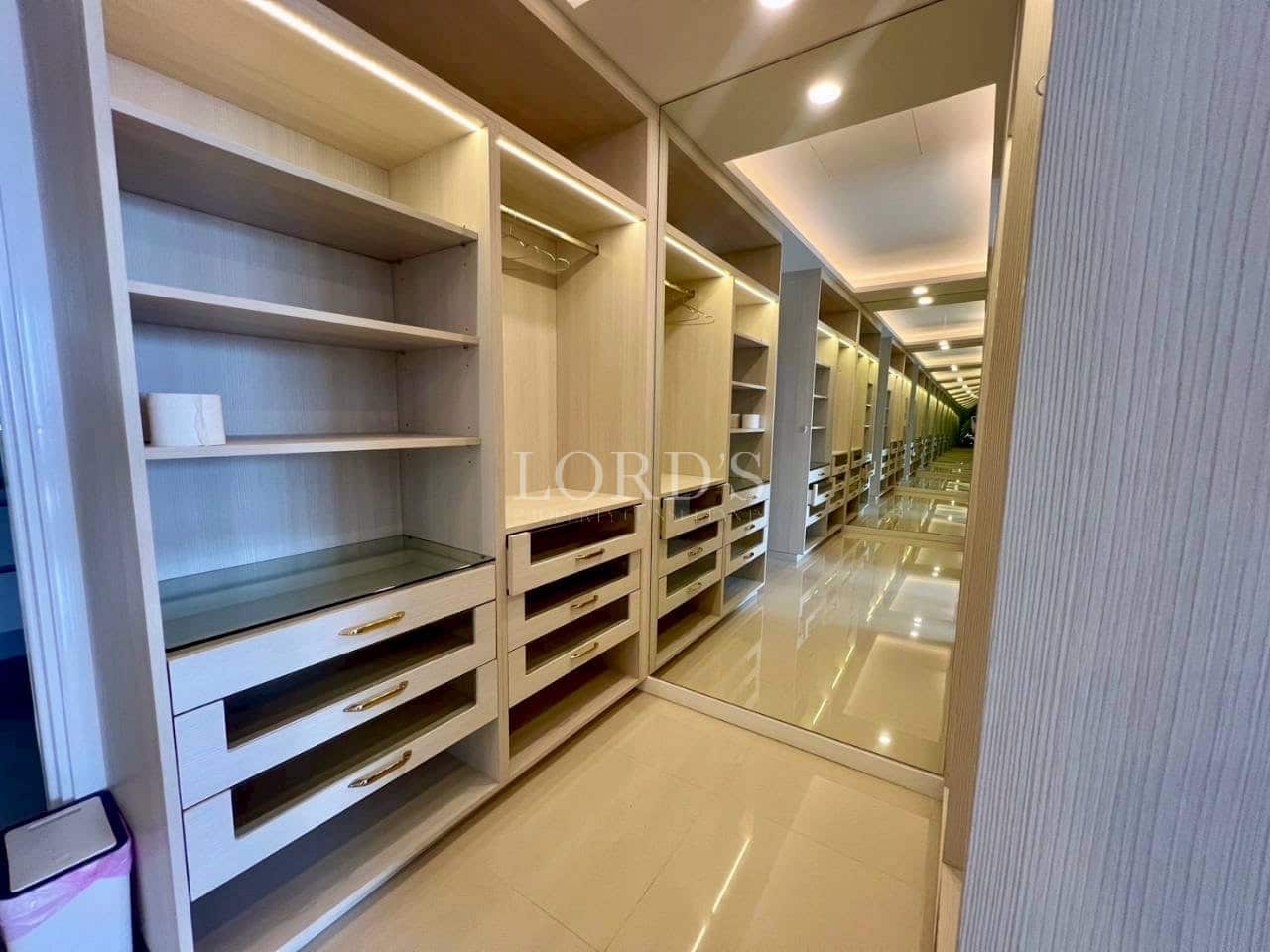 modern, custom-built walk-in closet