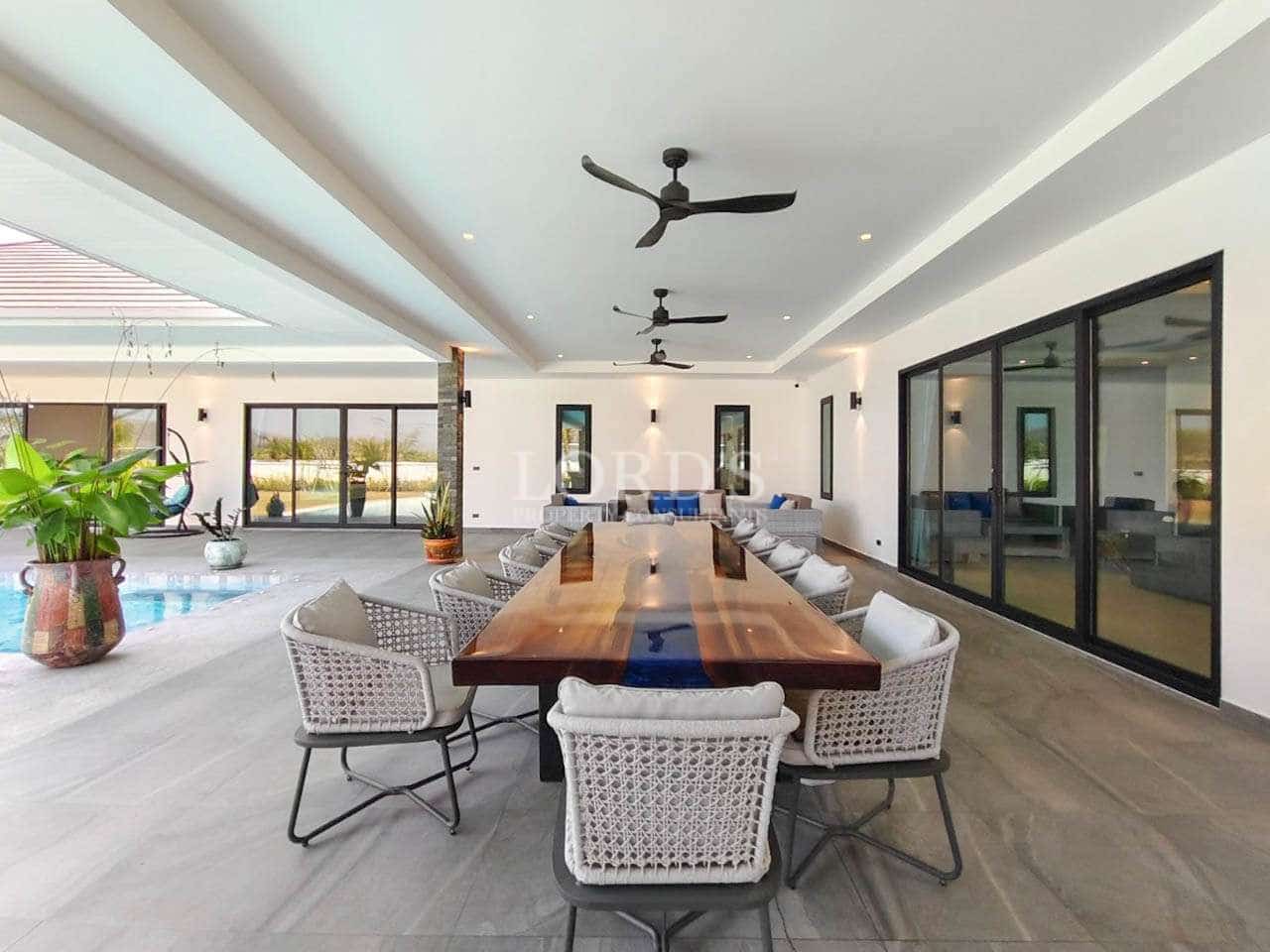 Modern dining area with pool view