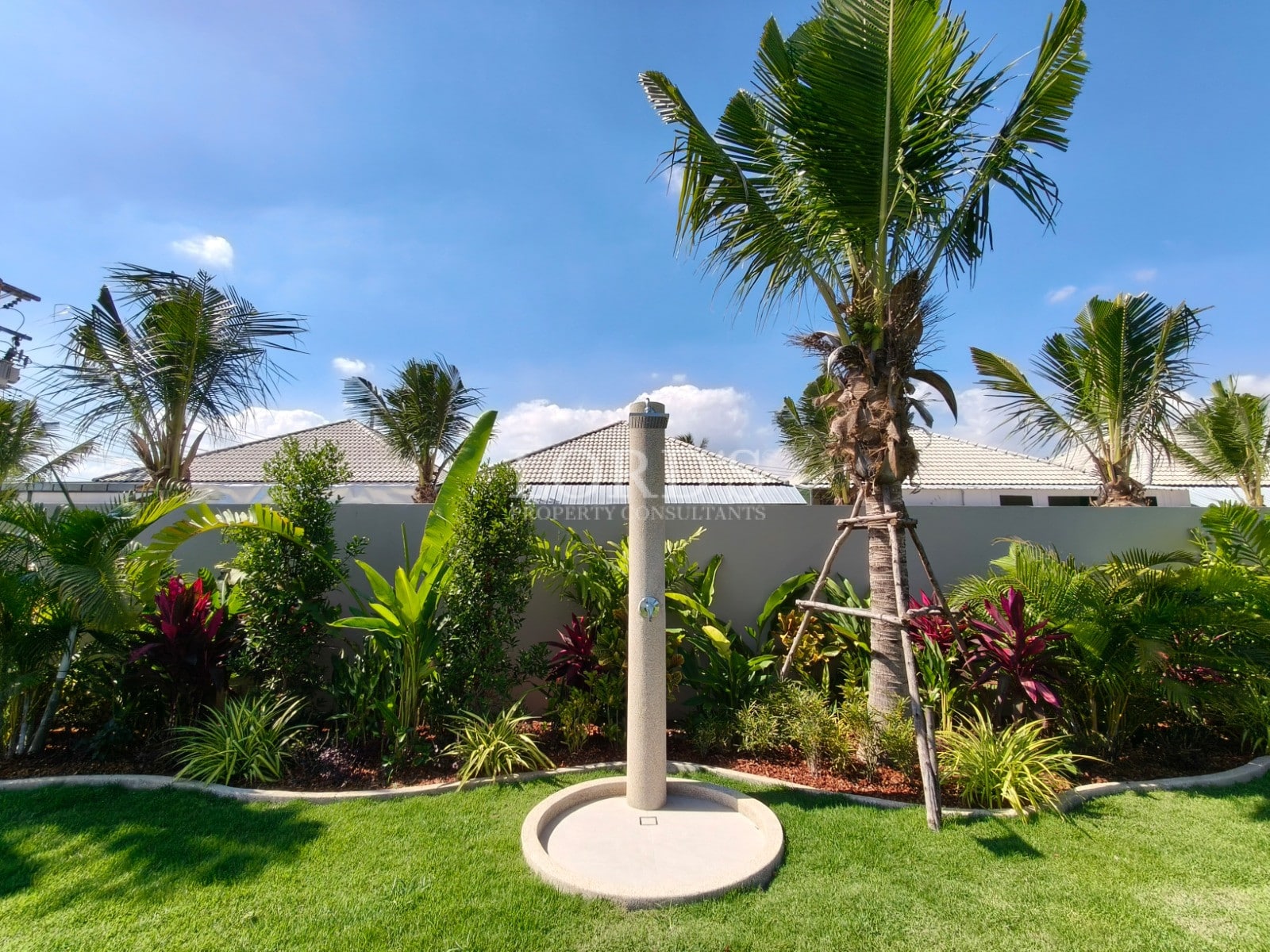 Outdoor shower in tropical garden setting