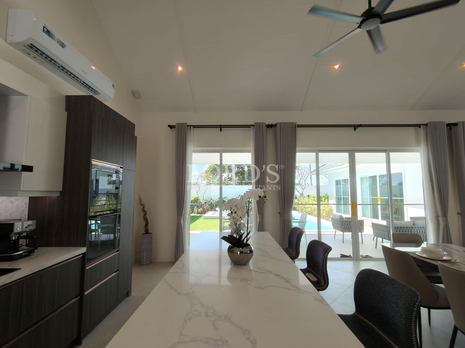Modern kitchen with elegant dining area
