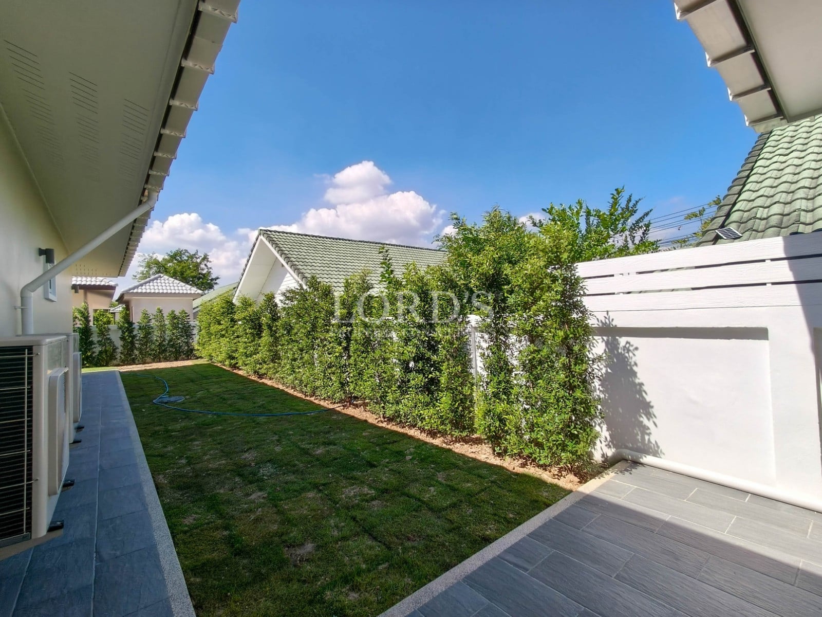 Lush garden with modern architecture