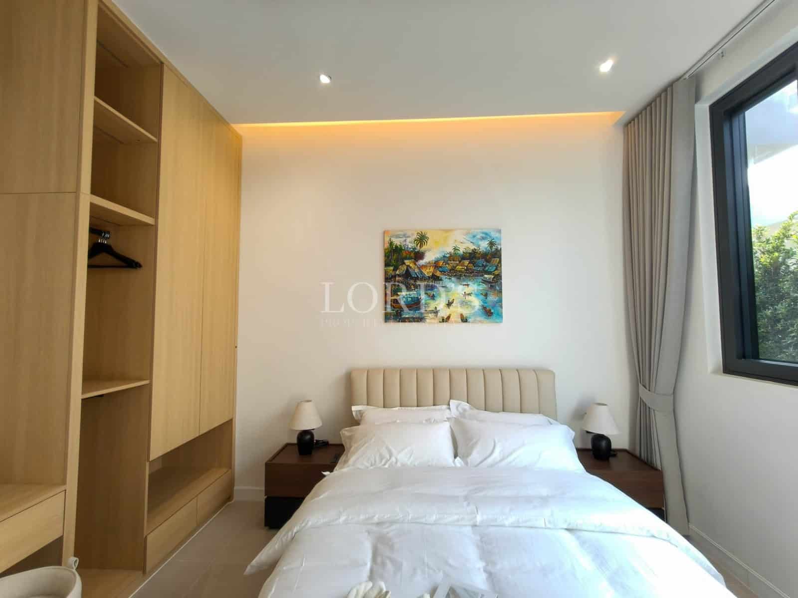 Cozy modern bedroom with artwork