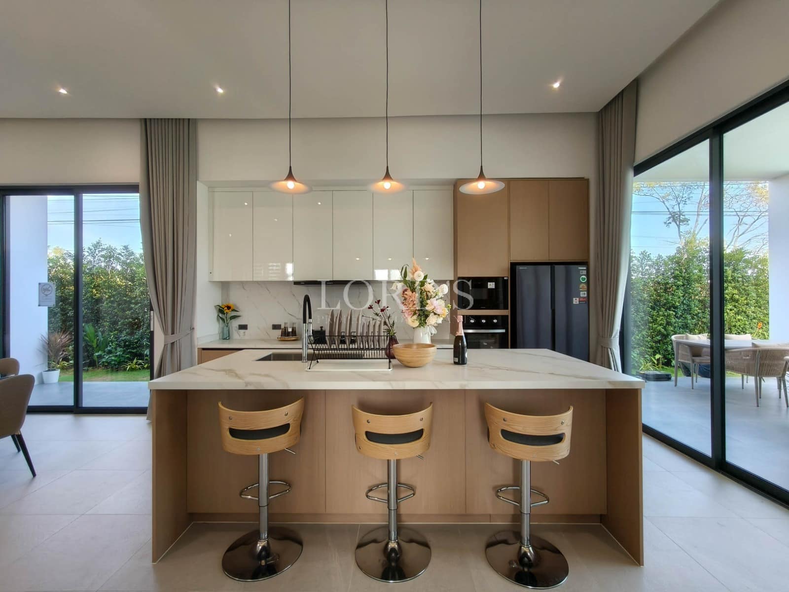 Modern kitchen with island seating.