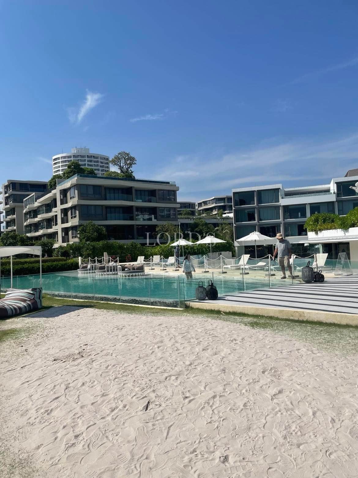 Modern resort with pool and beach