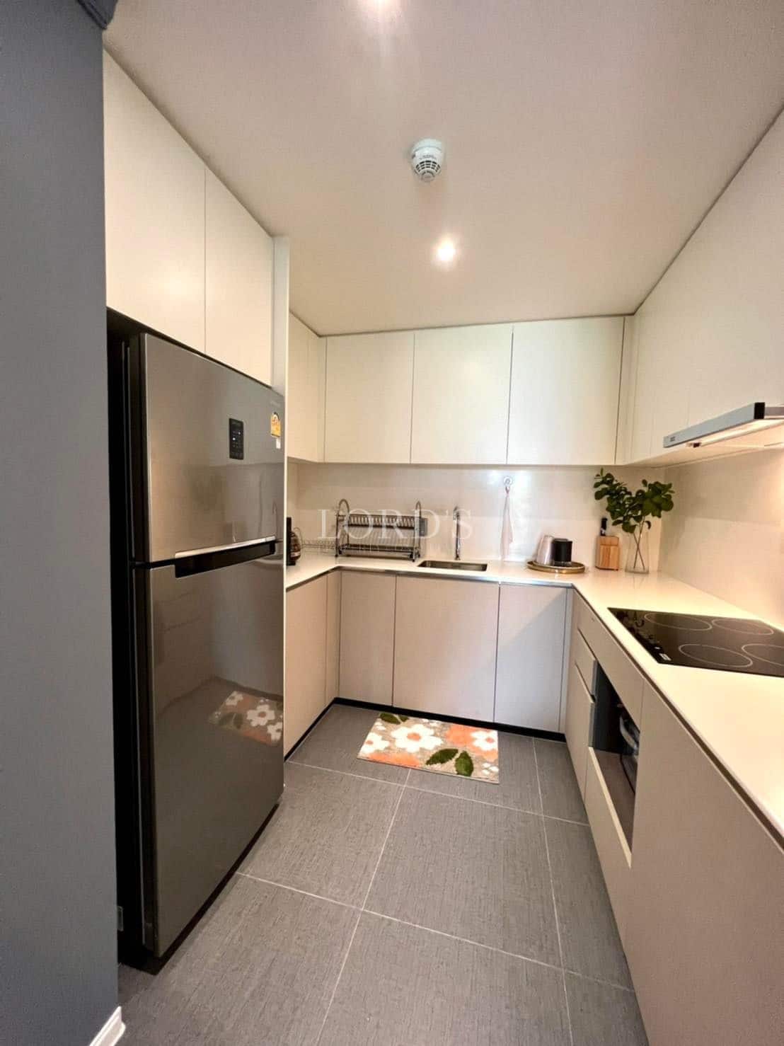 Modern kitchen with sleek appliances.