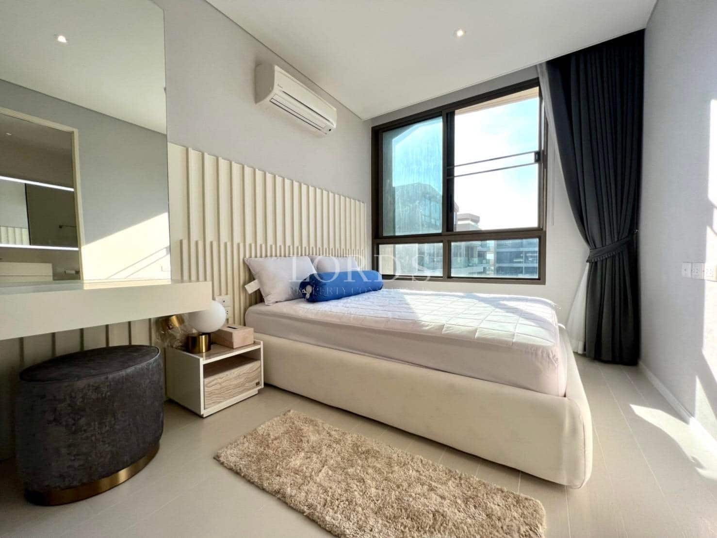 Modern bedroom with large window