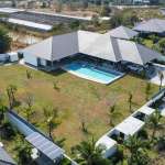 Aerial view of luxurious villa complex.