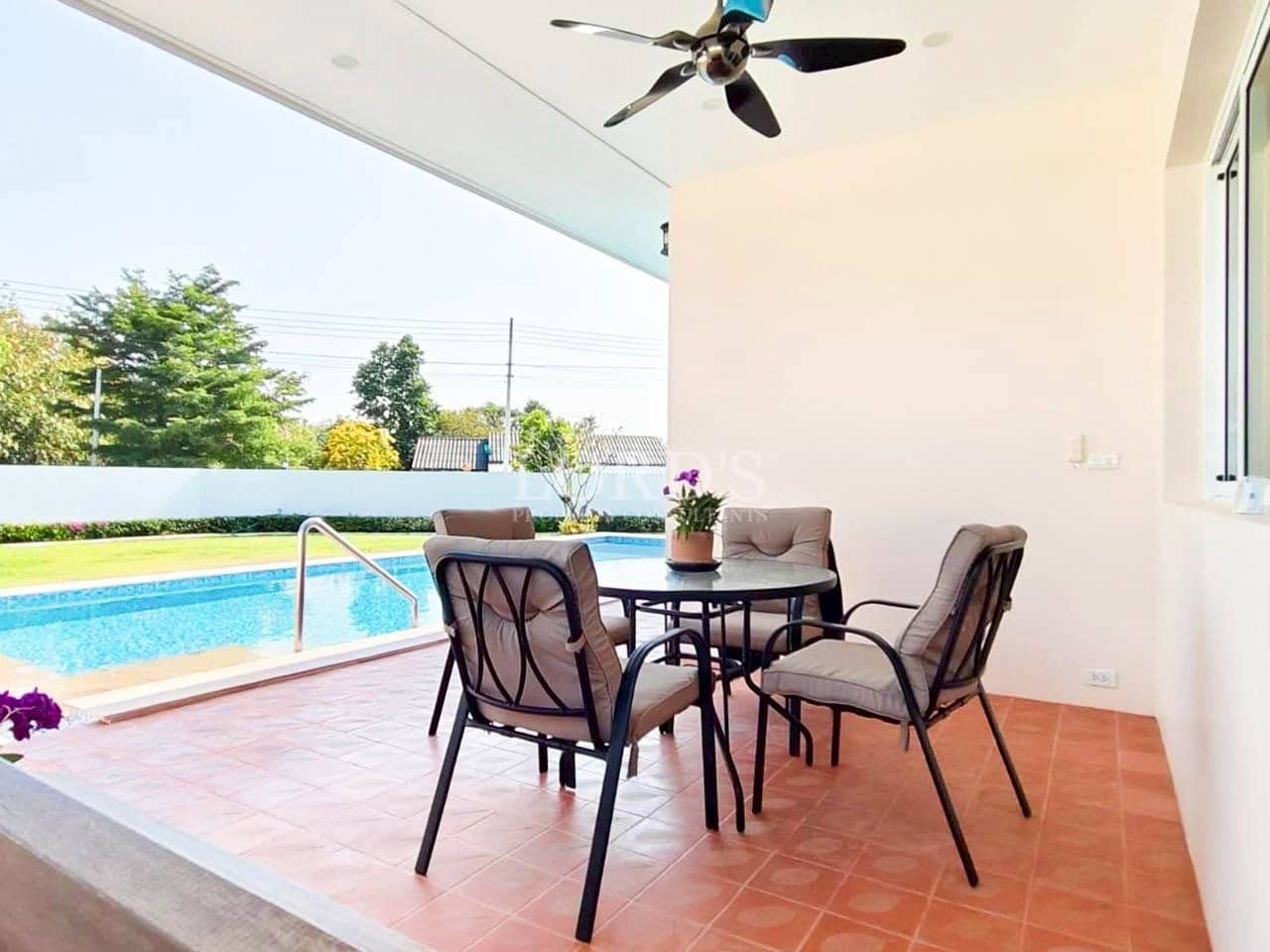 Outdoor seating by swimming pool